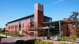 HEDCO building exterior during a sunny cloudless day