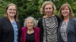 Emily Tanner-Smith, Judith Eisen, Karen Guillemin, and Leslie Leve facing the camera and smiling