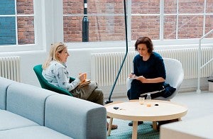 Two women talking